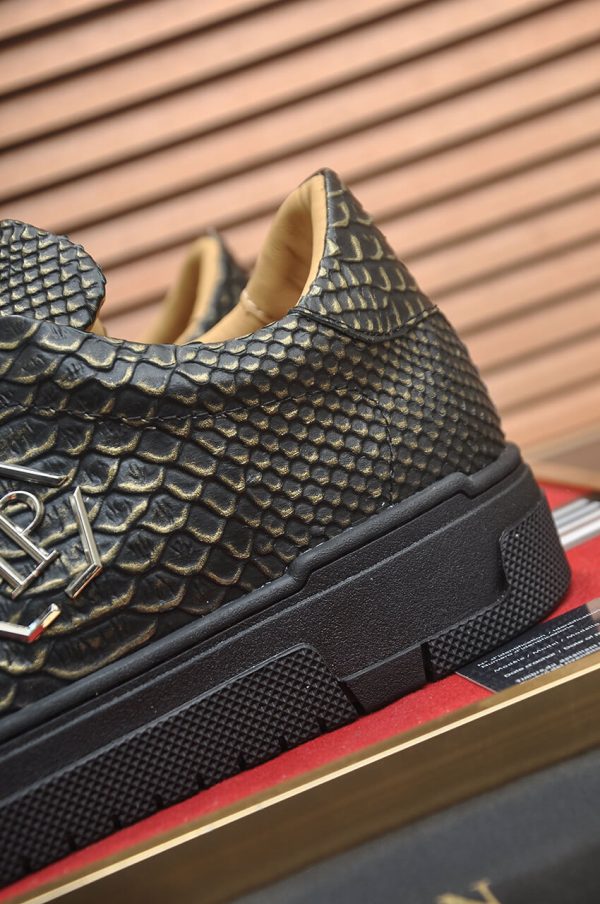Philipp Plein black real python leather lo-top sneakers.