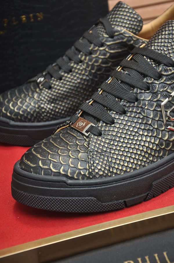 Philipp Plein black real python leather lo-top sneakers.