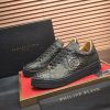 Philipp Plein black real python leather lo-top sneakers.