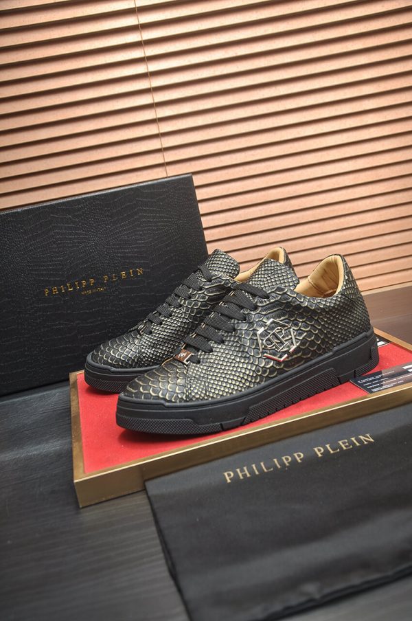 Philipp Plein black real python leather lo-top sneakers.