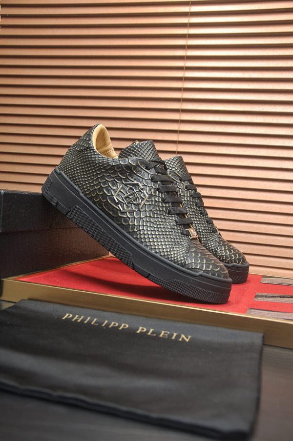 Philipp Plein black real python leather lo-top sneakers.