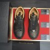 Philipp Plein black real python leather lo-top sneakers.