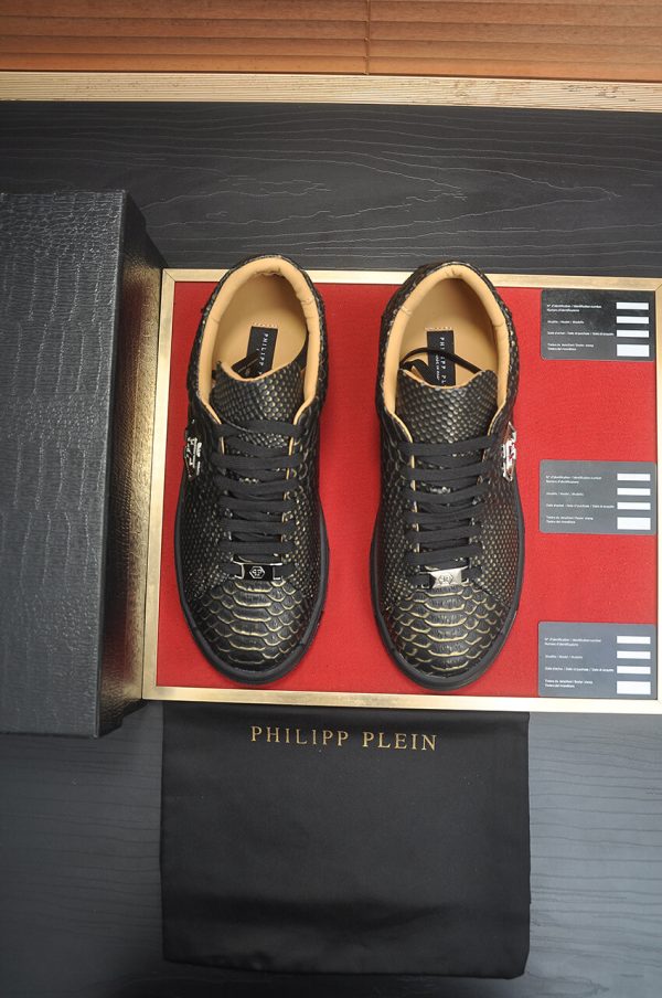 Philipp Plein black real python leather lo-top sneakers.