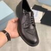 Prada black patent-leather derby shoe. (2) Prada black patent-leather derby shoe.