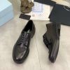 Prada black patent-leather derby shoe. (4) Prada black patent-leather derby shoe.