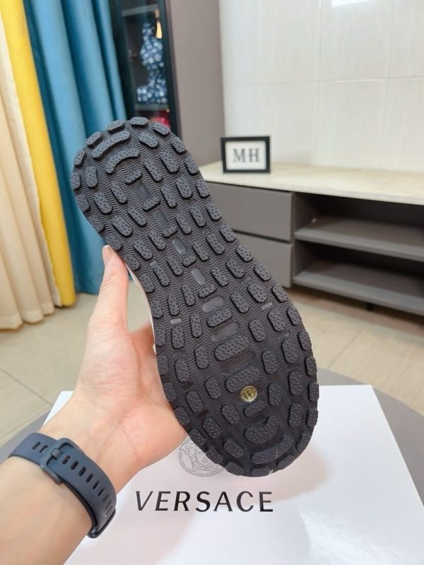 Versace Jeans Couture white and gold Barocco-print low-top sneakers.