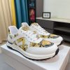 Versace Jeans Couture white and gold Barocco-print low-top sneakers.