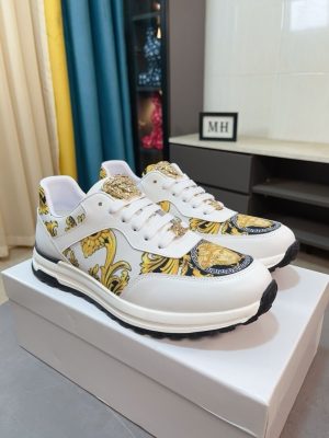 Versace Jeans Couture white and gold Barocco-print low-top sneakers.