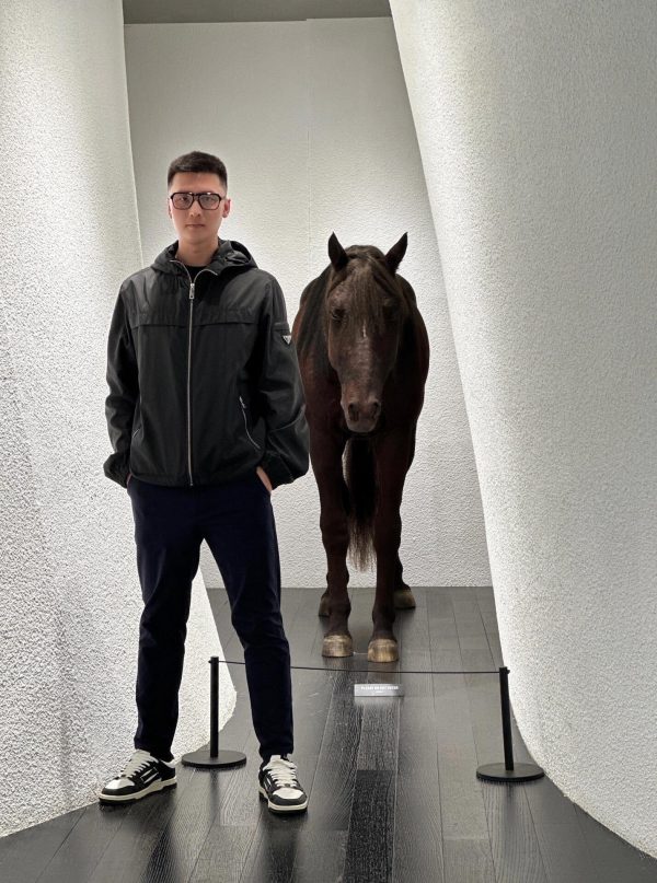 163e0df7 Prada Knitted Wool Polo Shirt- Dark Blue