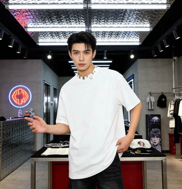 Balenciaga Pierced distressed-effect cotton T-shirt- White