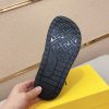 Fendi men's FF jacquard fabric slides.