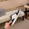 Prada Black and White Downtown Leather Sneakers