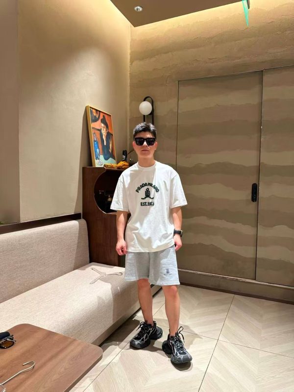 Prada Logo-Print Cotton-Jersey T-Shirt- White (1) Prada Logo-Print Cotton-Jersey T-Shirt- White