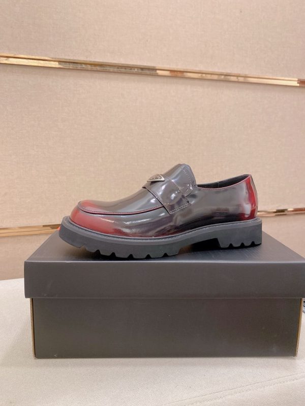 Prada brushed leather platform loafers.