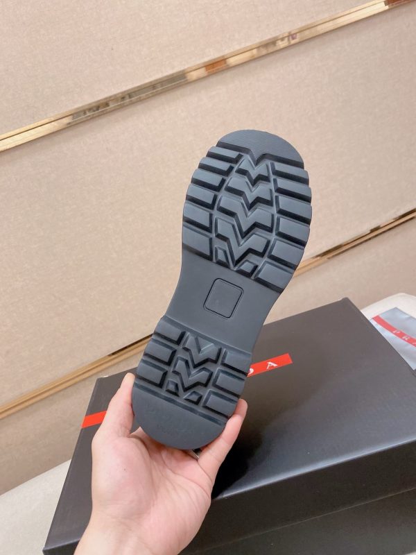 Prada brushed leather platform loafers.