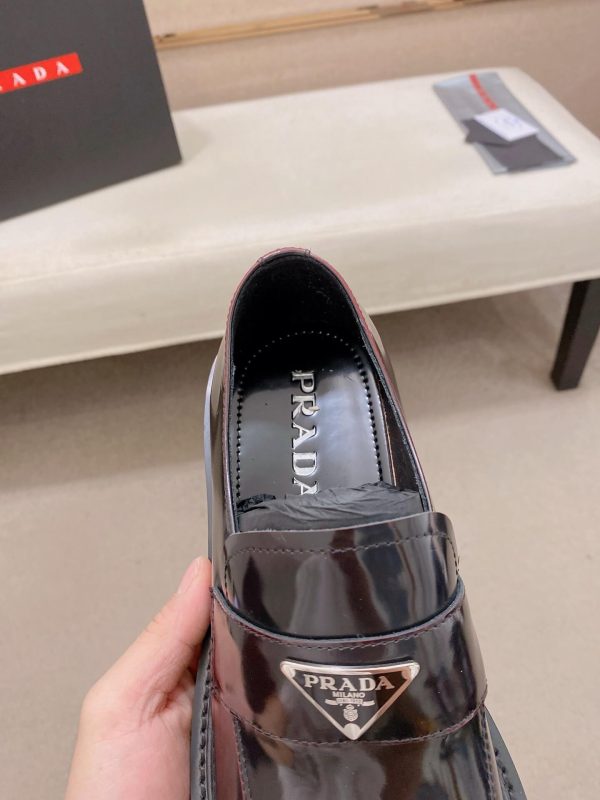 Prada brushed leather platform loafers.