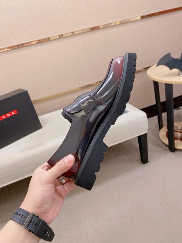 Prada brushed leather platform loafers.