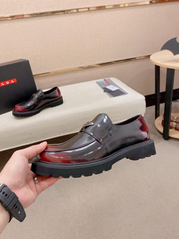 Prada brushed leather platform loafers.