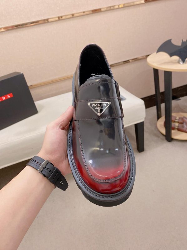 Prada brushed leather platform loafers.