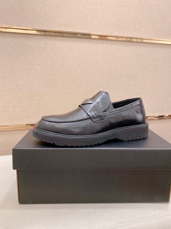 Prada leather platform loafers.