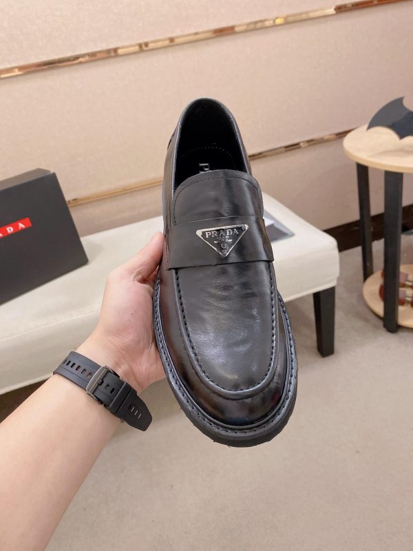 Prada leather platform loafers.