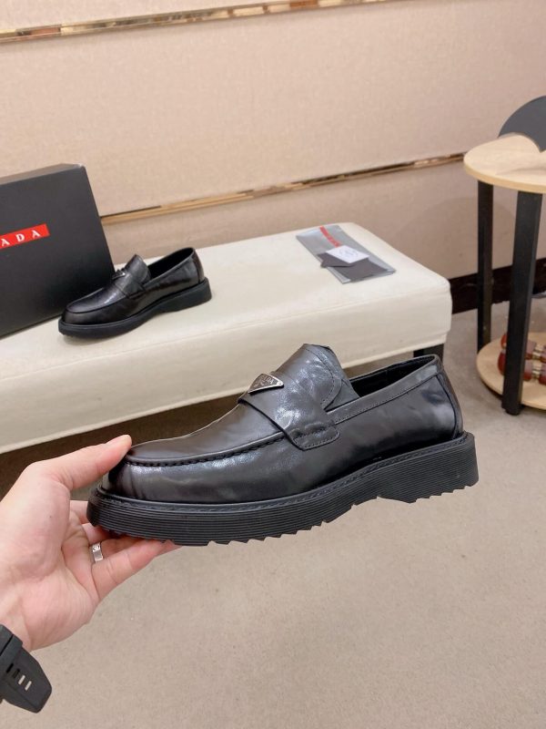 Prada leather platform loafers.