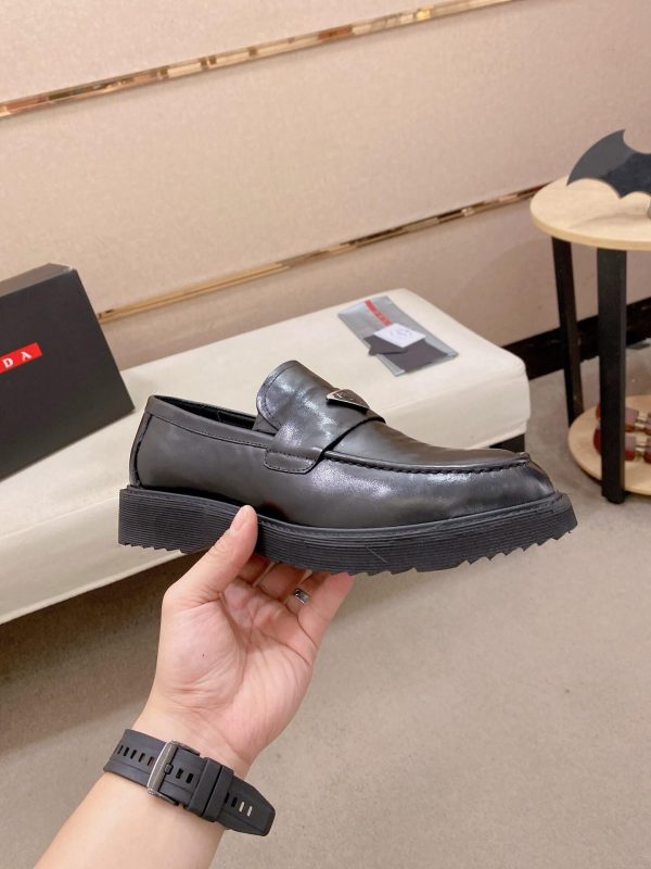 Prada leather platform loafers.