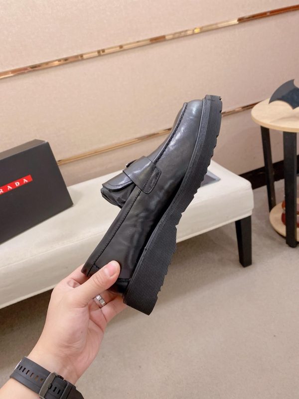 Prada leather platform loafers.