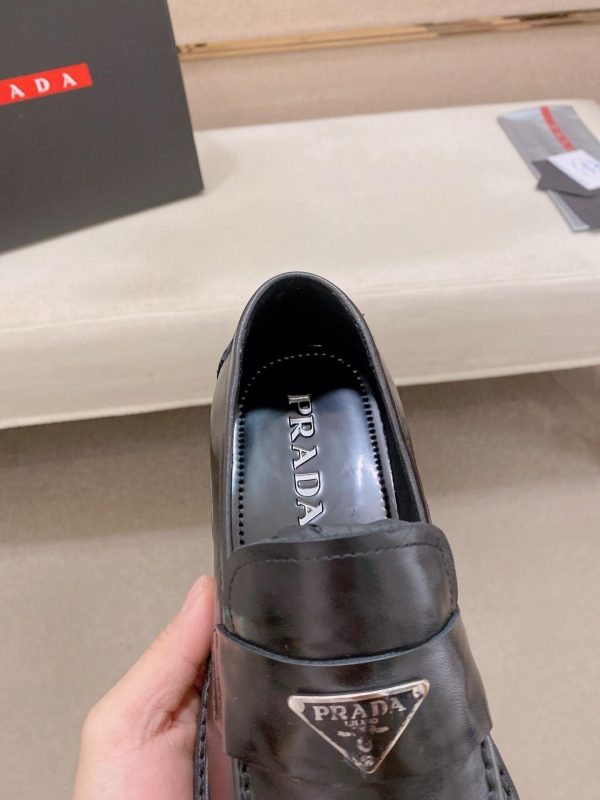 Prada leather platform loafers.