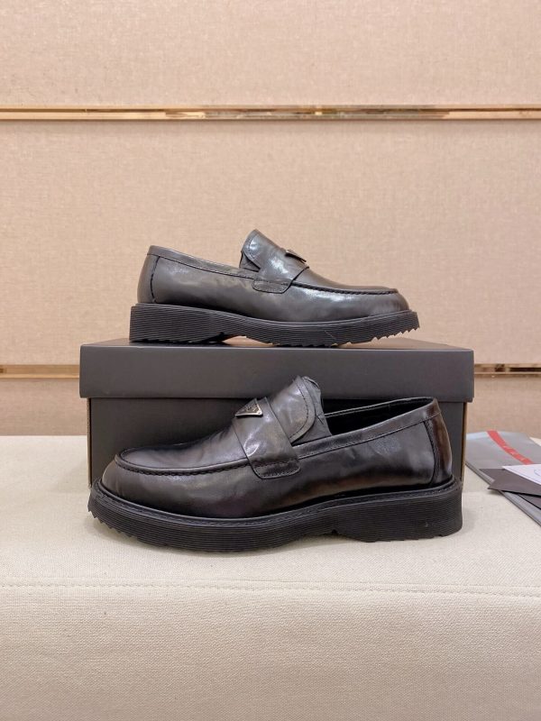 Prada leather platform loafers.
