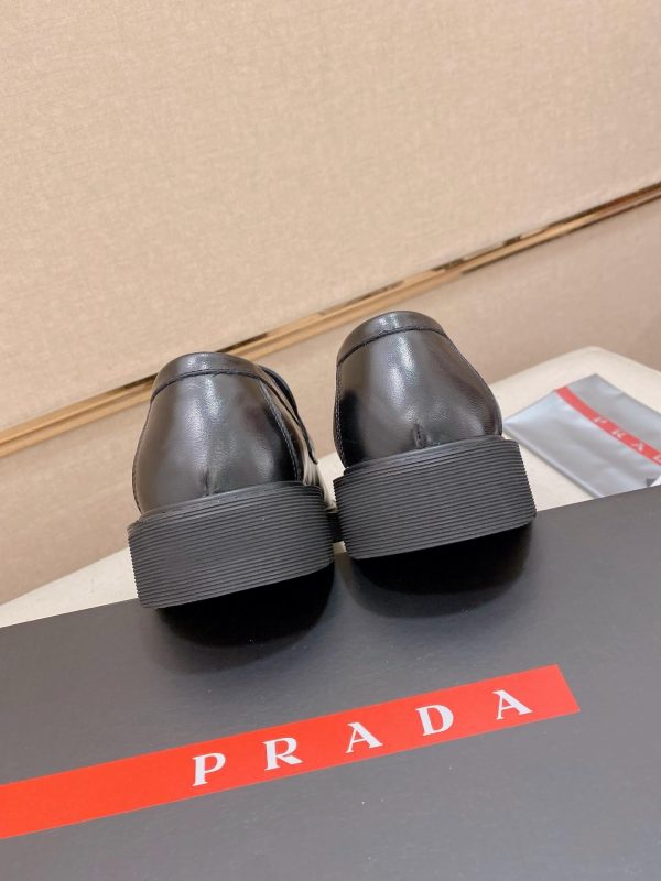 Prada leather platform loafers.