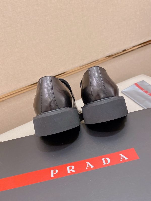Prada leather platform loafers.