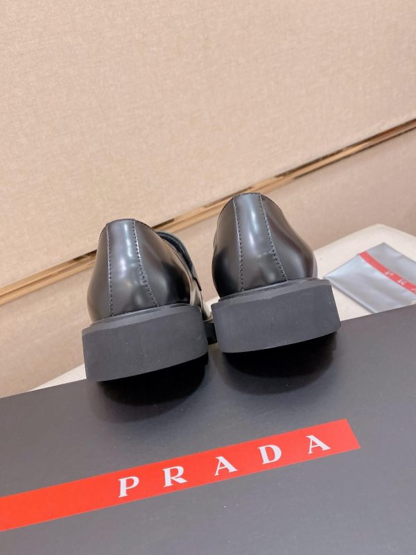 Prada leather platform loafers.