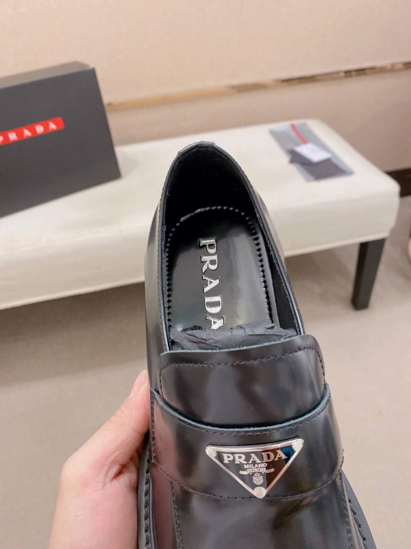 Prada leather platform loafers.