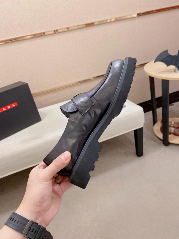 Prada leather platform loafers.