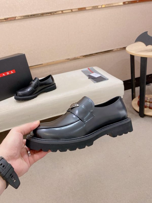 Prada leather platform loafers.