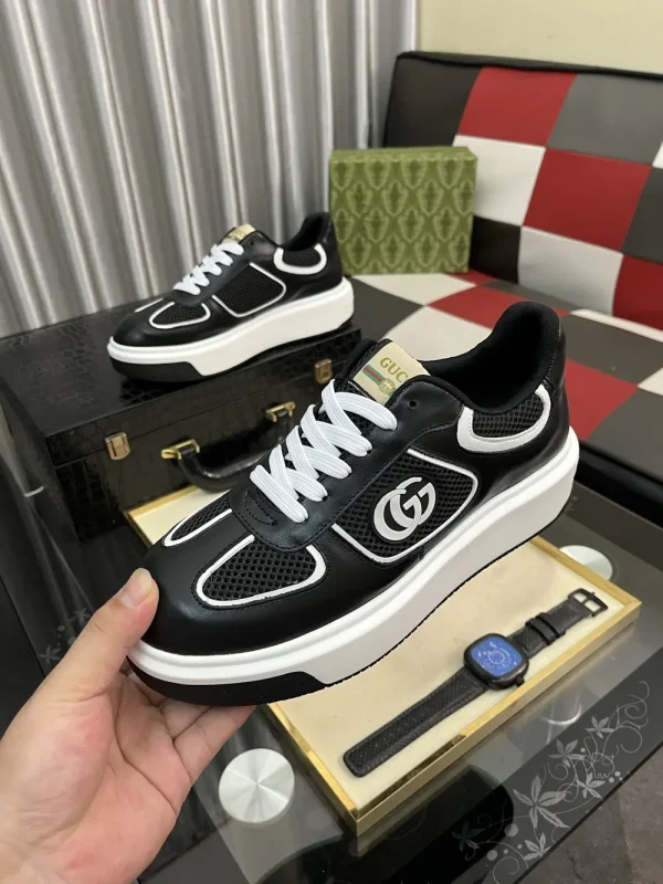 gucci-mens-black-leather-sneaker-modern-design-side-view-2 Gucci Men's Black Leather Sneaker - Unique Modern Design