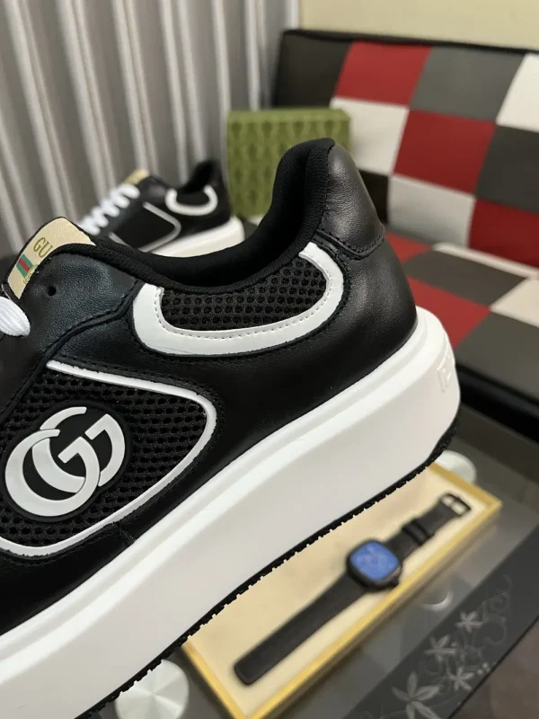 gucci-mens-black-leather-sneaker-modern-design-side-view Gucci Men's Black Leather Sneaker - Unique Modern Design