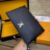 Louis Vuitton Lock and Walk Black Leather Clutch
