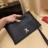 Louis Vuitton Pochette Voyage Men's Black Leather Clutch