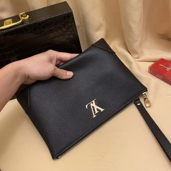 Louis Vuitton Pochette Voyage Men's Black Leather Clutch