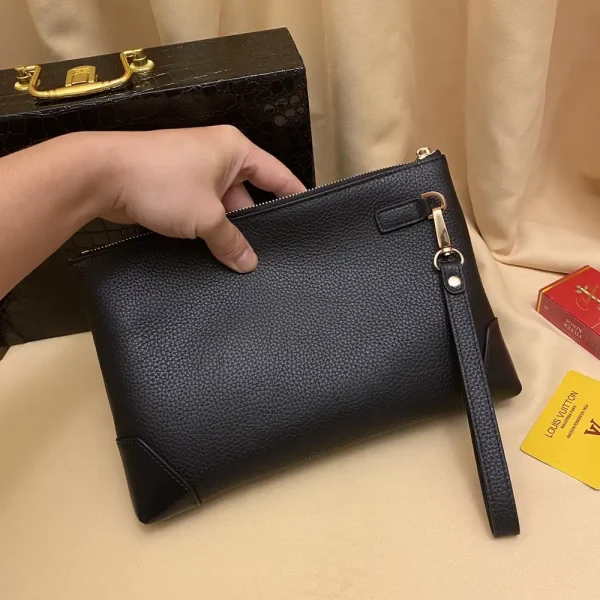 Louis Vuitton Pochette Voyage Men's Black Leather Clutch