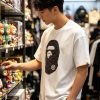 A Bathing Ape (BAPE) College Monogram Ape Head Relaxed Fit Tee- White