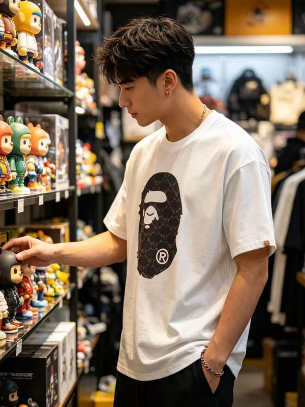 A Bathing Ape (BAPE) College Monogram Ape Head Relaxed Fit Tee- White