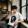 A Bathing Ape (BAPE) College Monogram Ape Head Relaxed Fit Tee- White