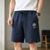 Off-White Diag Stencil Sweatshorts- Black with white and pink accents.
