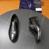 Prada Brushed Leather Penny Loafers – Classic Black