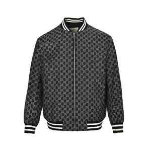 Front view of the Gucci GG Monogram Zip Varsity Bomber Jacket in Black and White featuring a center zip closure and striped ribbed collar.
