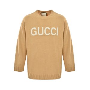 Front view of the Gucci Intarsia Logo Knit Crewneck Jumper in camel featuring prominent white block lettering across the chest.