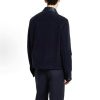 Back view of the dark navy Gucci Interlocking G Corduroy Jacket highlighting the straight hem and contrasting glossy collar.